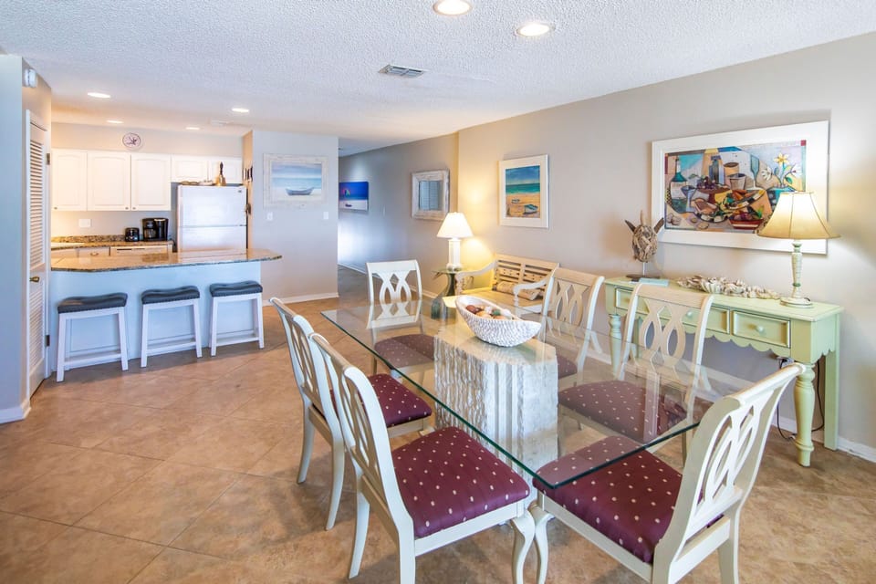 Another view of dining area with seating for 6 plus 3 bar stools. Gulf views!