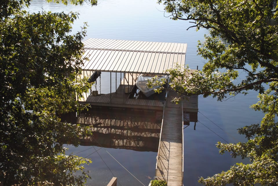 100 ft. of shore,  two boat slips & plenty of space to swim and fish