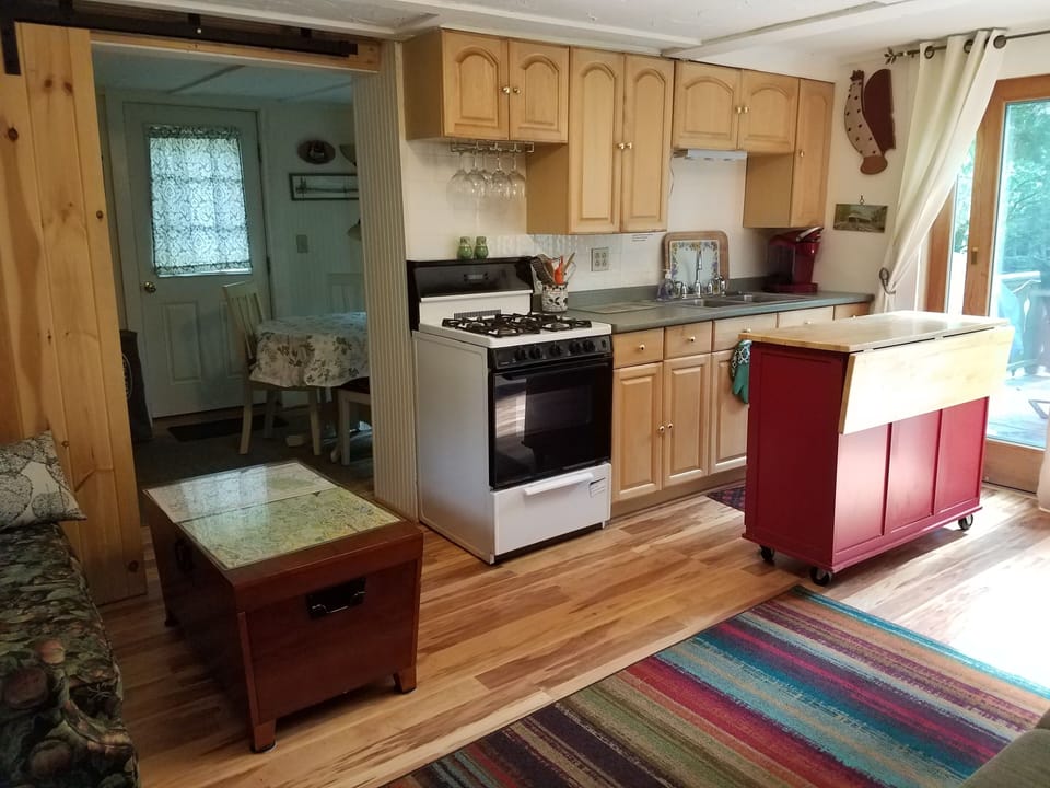 Kitchen area, with slider to deck.