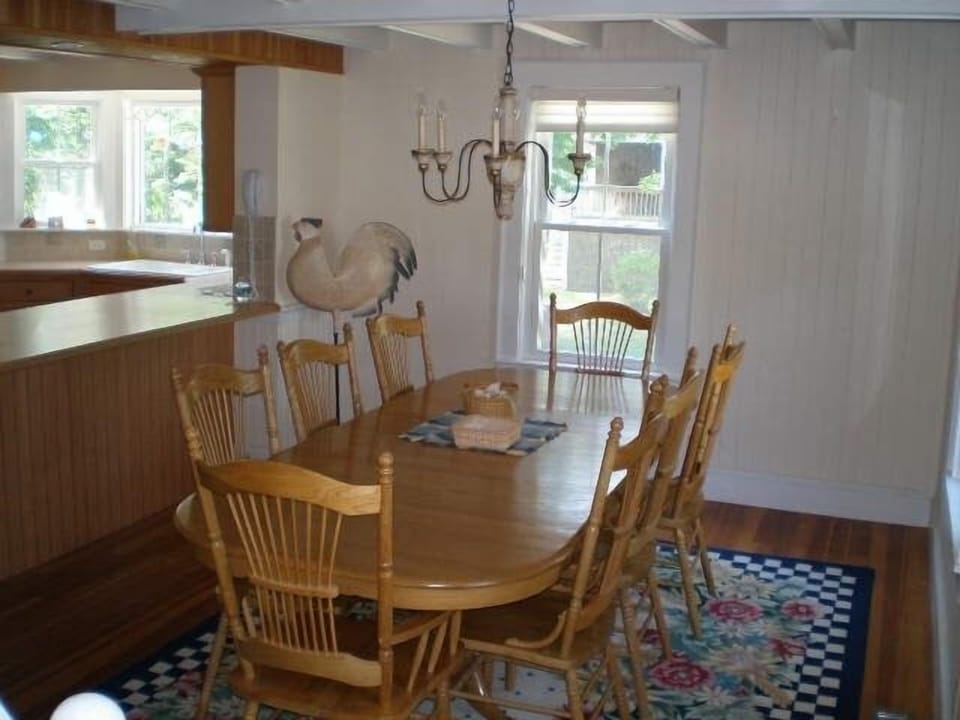 Diningroom with table that seats 8. Additional 3 stools at the kitchen counter.