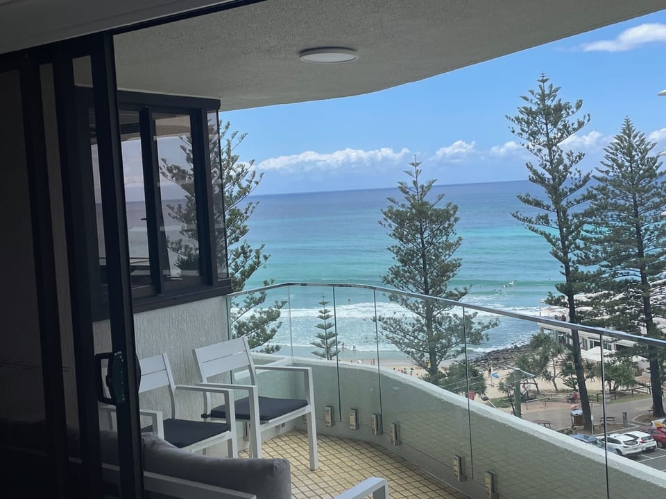 The unit is in the closest building to Burleigh Beach flagged area.