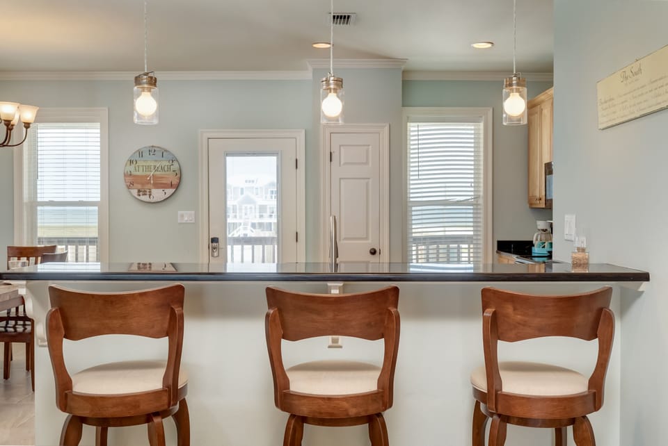 Hang out with the cook at the kitchen Island