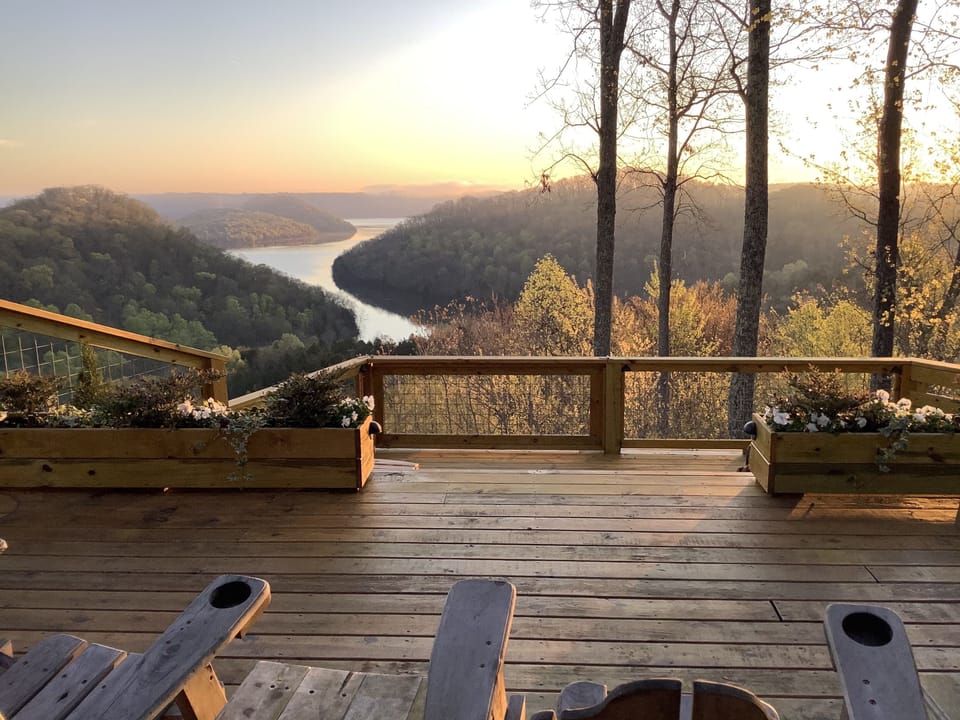 2 level deck with rocking chairs and an amazing view.  "Sunrise is my favorite"