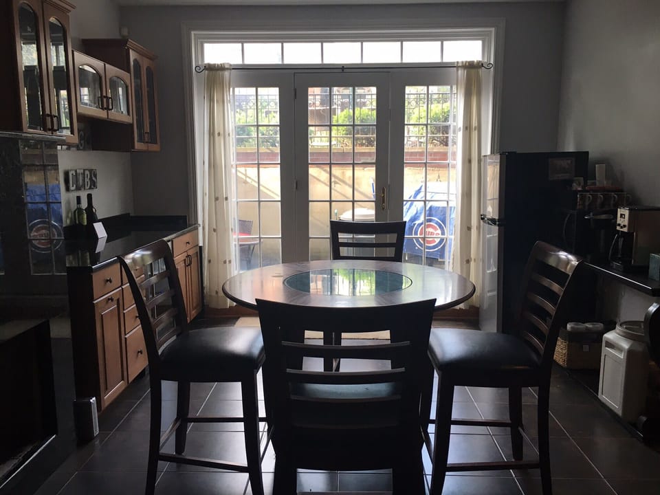 Kitchenette that walks out to the patio where you will see hundreds of Cubs fans