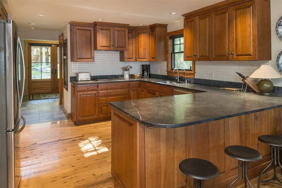 Kitchen area in main home directly on the Lake.