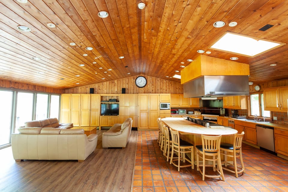 Open concept Kitchen and living area.
Pool Table & Dining Table in other half 