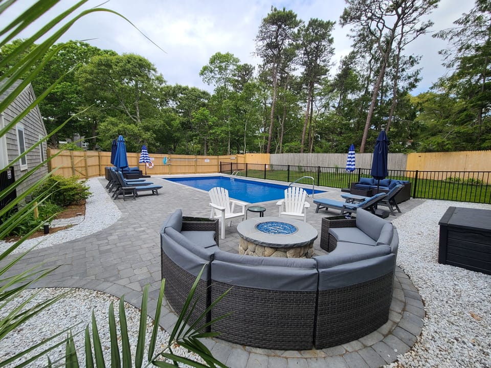 After a day at the beach and dip in  the pool, relax around a  gas fire pit