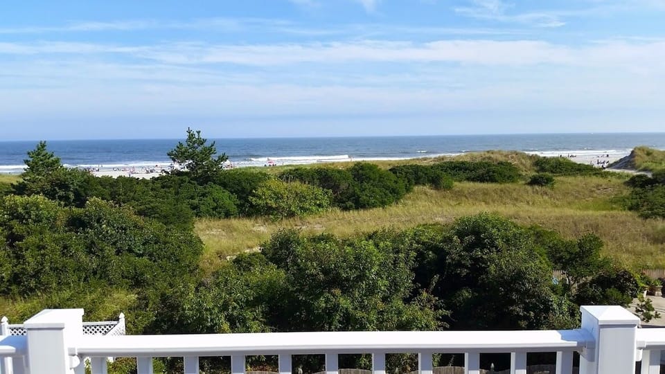 Beach acess closer than it looks, approximately 100ft.  100ft through dunes.