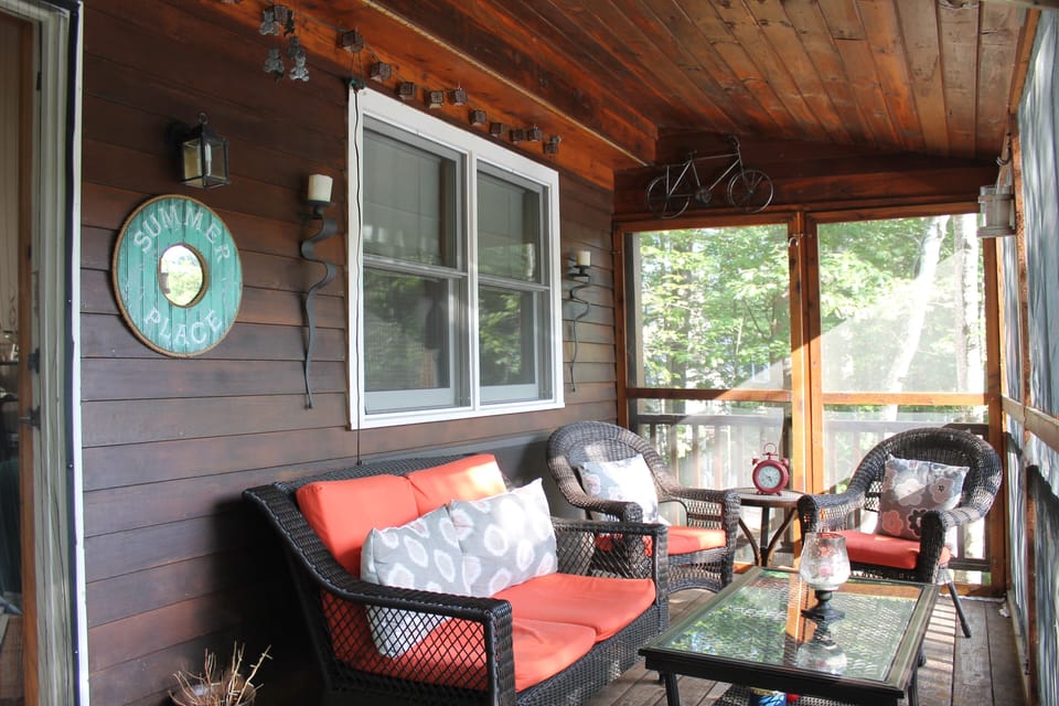 Screened in porch overlooking Belleau Lake