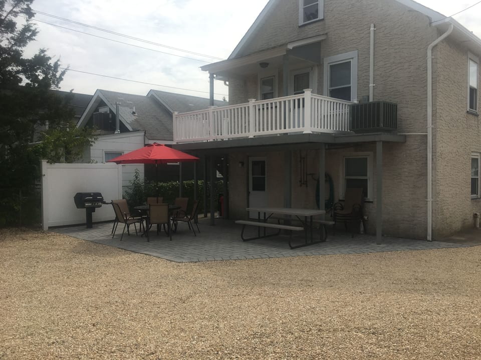 304 Webster rear paver patio with table and chairs and grill