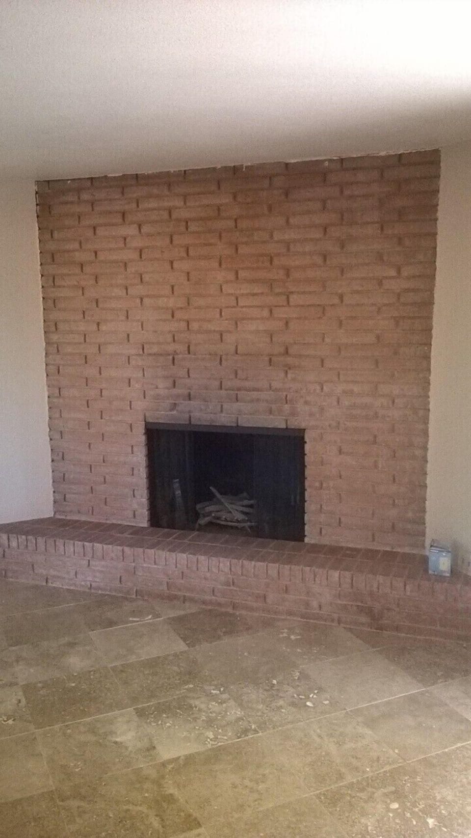 Wood Burning Fireplace ,family room area with exit to back yard.

