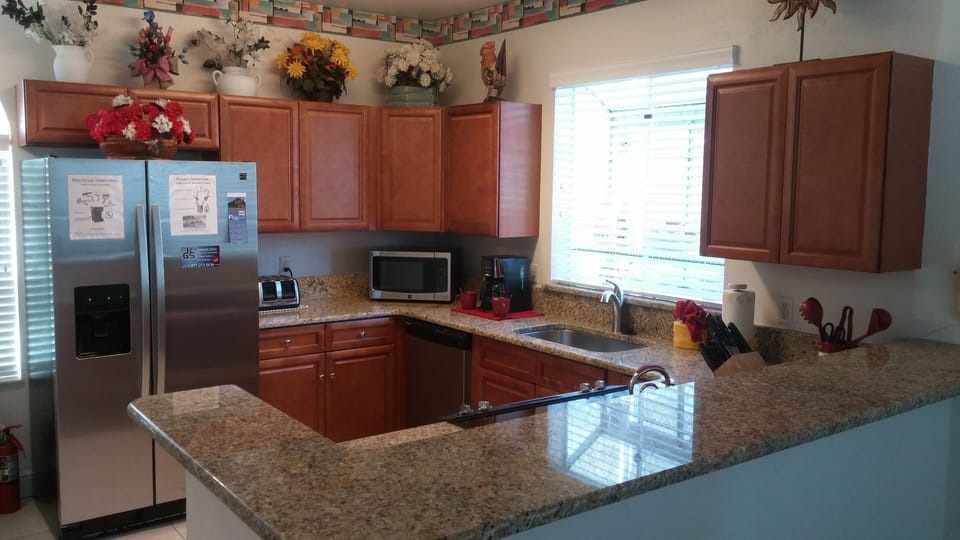 New Remodeled Kitchen with  Granite Counter Tops and Stainless Steel Appliances