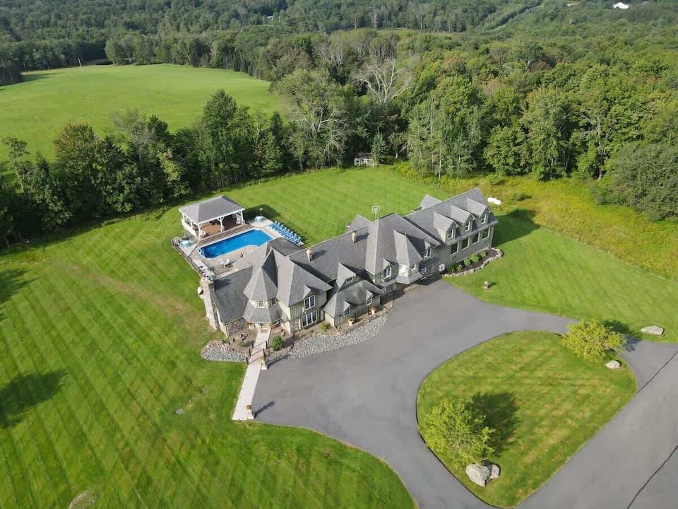 Hilltop Mansion sits on 130 acres with private trails