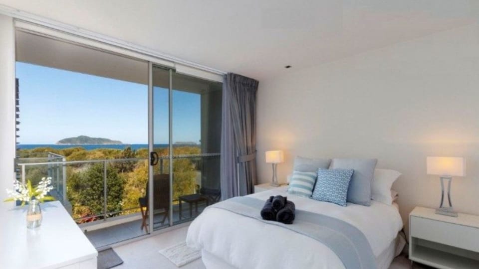 Stunning master bedroom with beautiful cotton sheets and gorgeous sea views