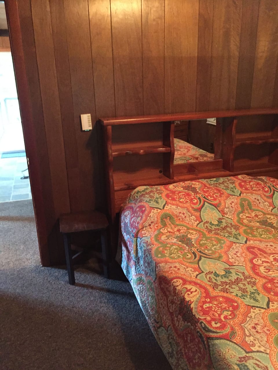 Master bedroom showing part of the headboard.
