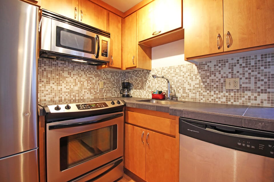 Stainless steel appliances w/dishwasher.

