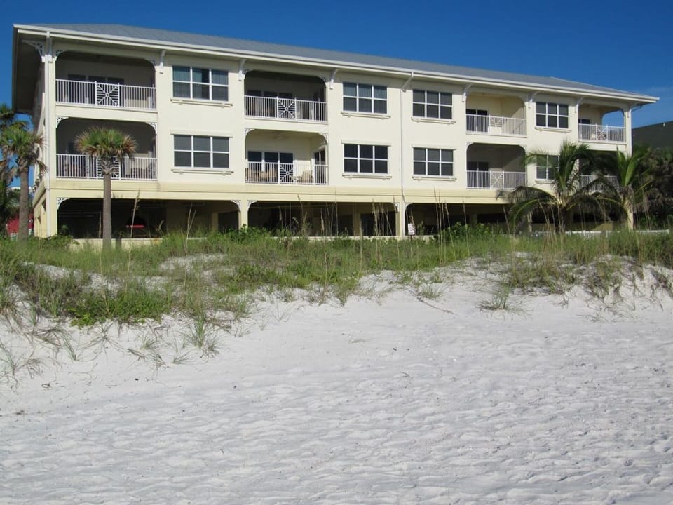Walk directly onto the powdery white beach sand...