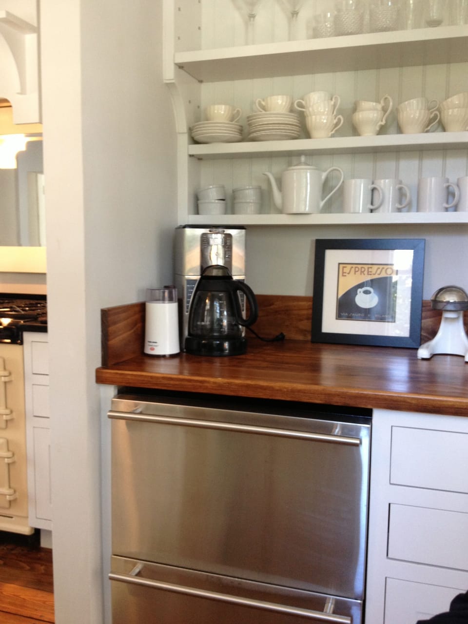 Old pantry is now the wine-coffee bar with 2-drawer fridge and wood countertops