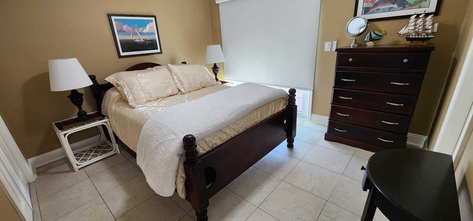 Downstairs Queen w/ private full bath and entry to back deck
