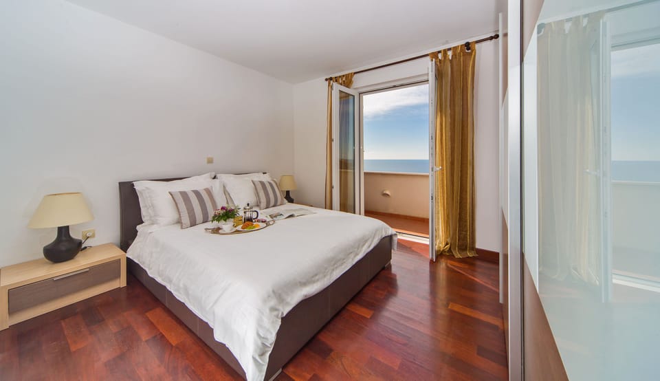Master bedroom opens onto balcony