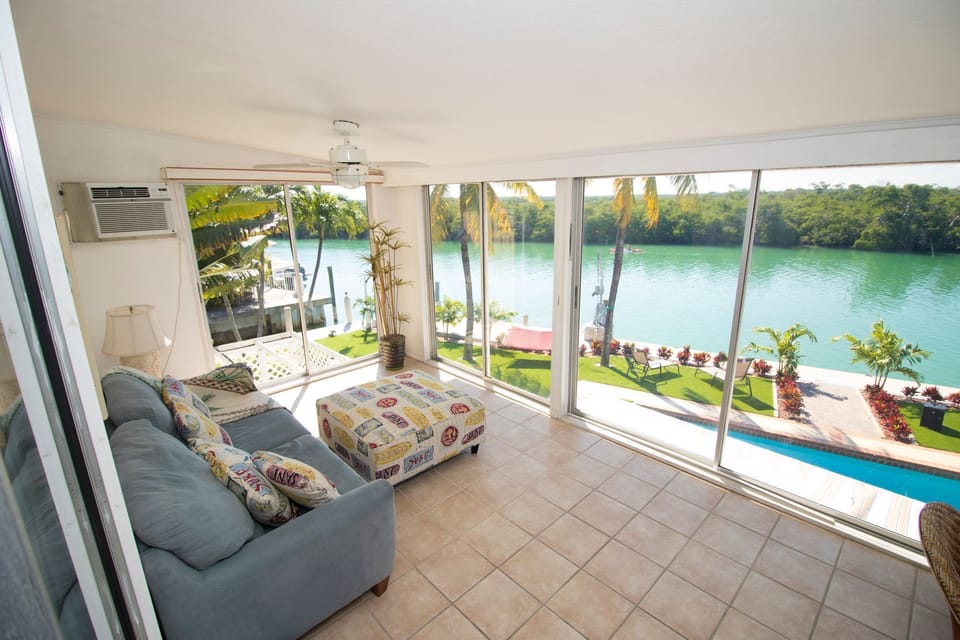 Flat-screen TV, DVD player, books, stereo