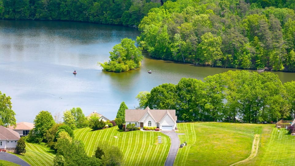 This gorgeous lake house is situated on breathtaking Plentiful cove.  