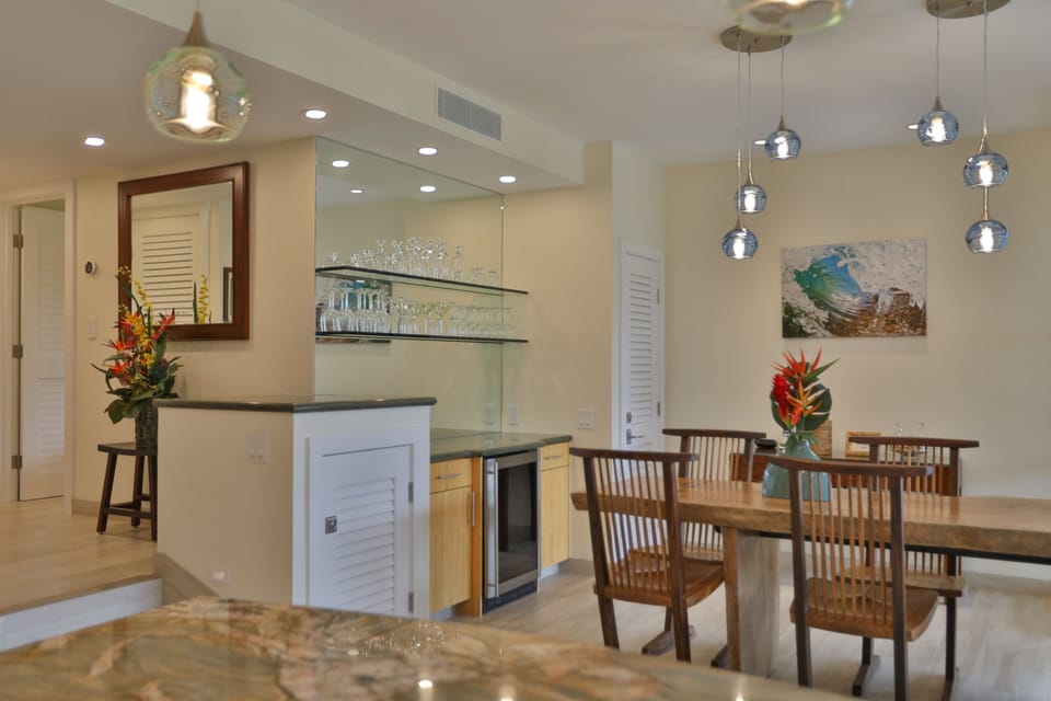 View from kitchen into dining area and the entryway into the bedroom wing
