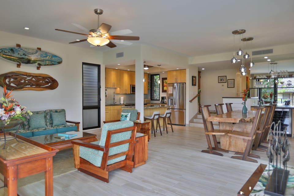Large, open floor plan -- living room, kitchen, and dining area
