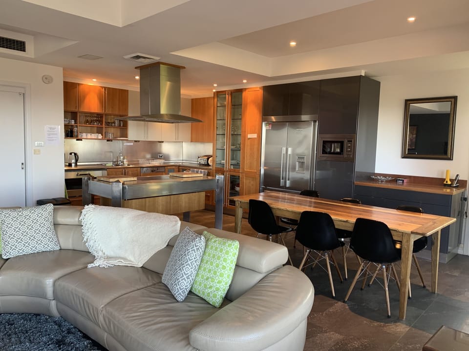 Open plan kitchen, dining and lounge area
One high chair available