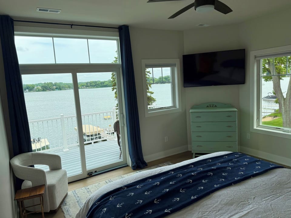 Panoramic lake view from the master bedroom.