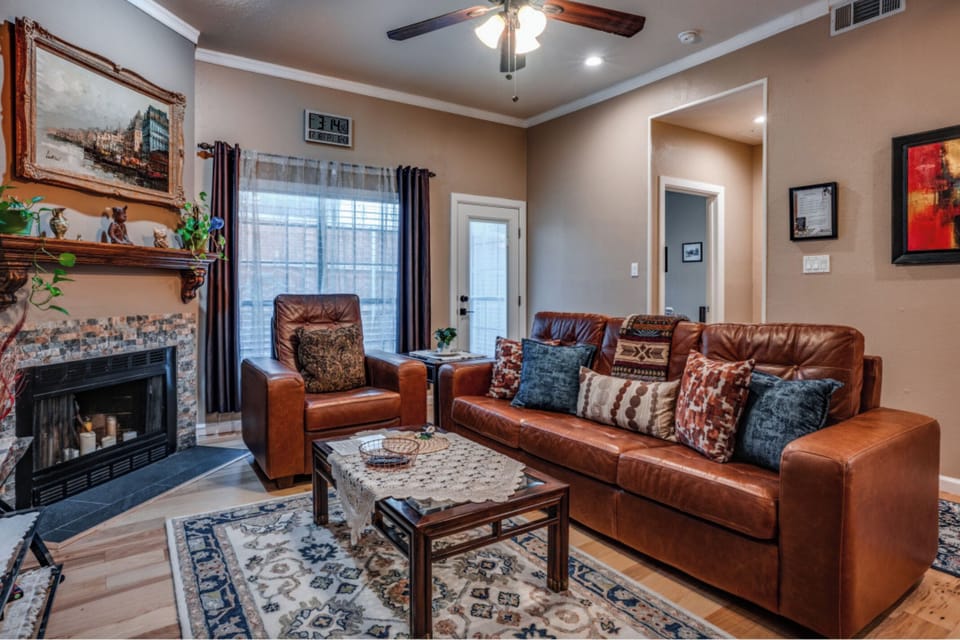 Our living room with top quality leather couch and a lazy boy chair