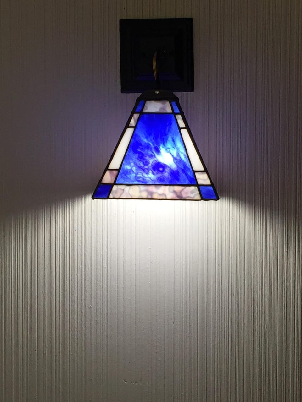 Hallway with stained glass light