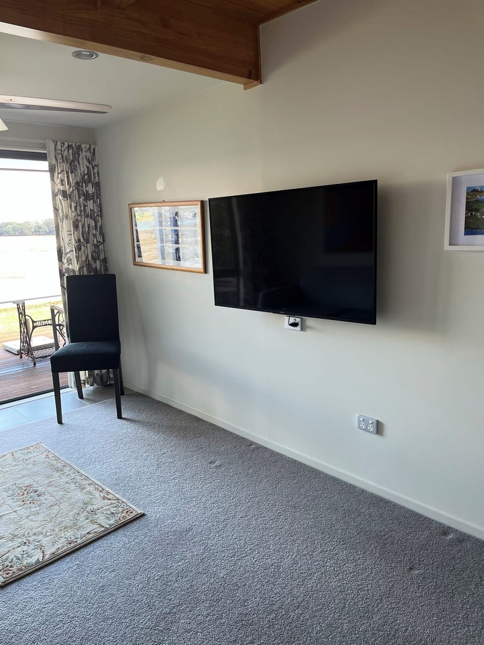 Sitting room, with smart TV and access to the deck