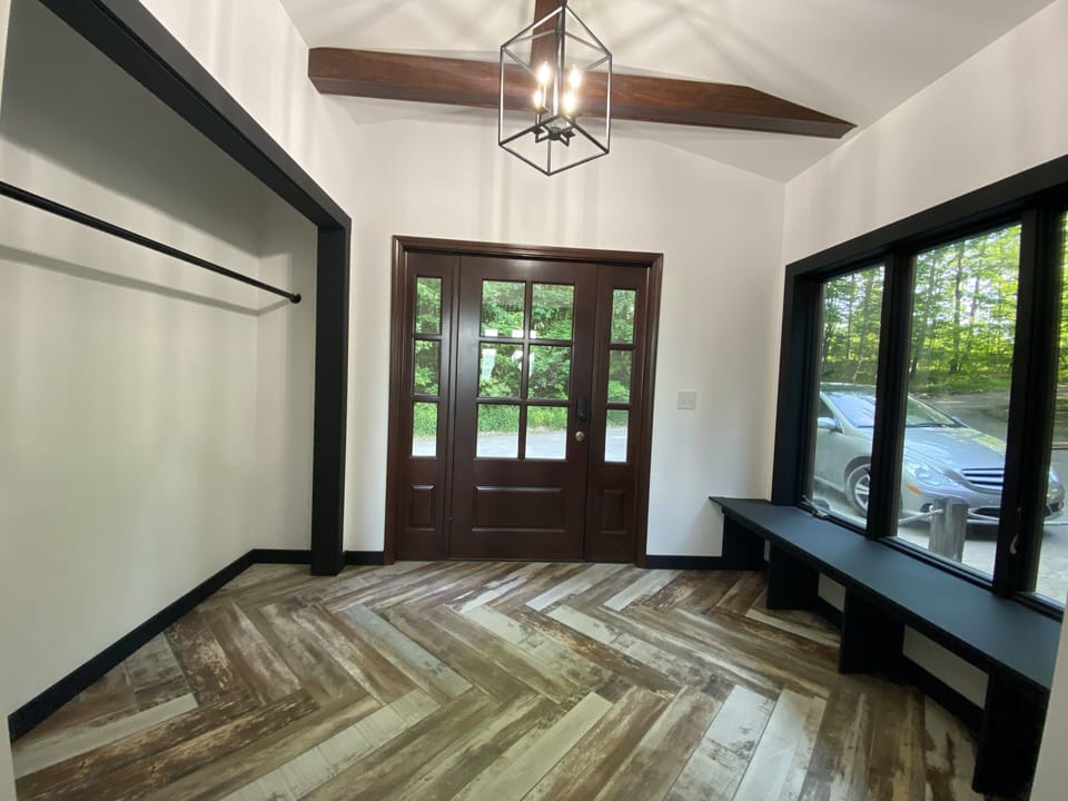 Entryway mud room. Soon the closet will have barn doors! 