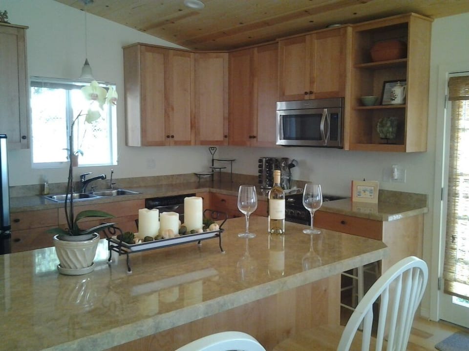 Well appointed kitchen, vaulted pine ceiling, Custom Built Cabinets, Very Bright