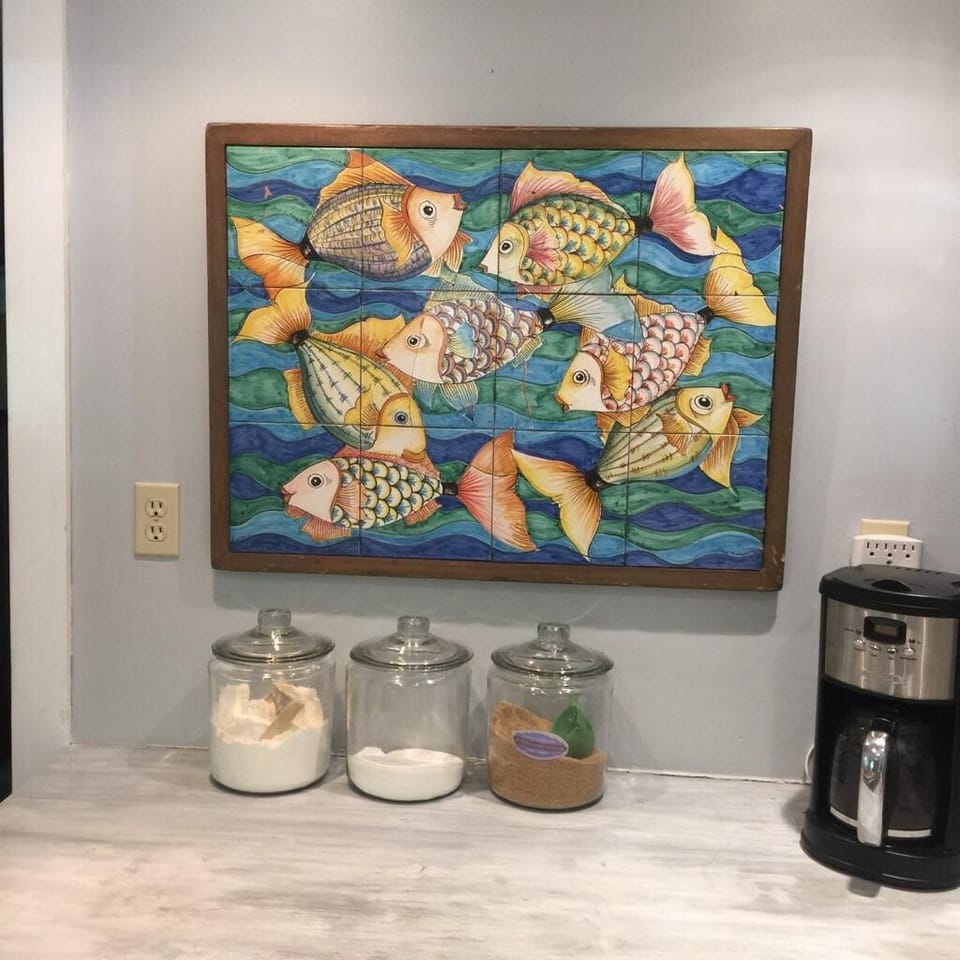 Italian fish art in kitchen