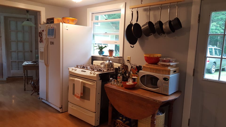 Refrigerator, gas range with convection oven and microwave
