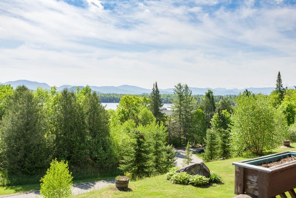 The amazing view from our deck, hear the loons, watch the sun or moon rise... 