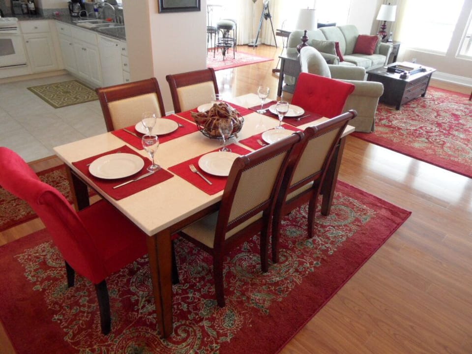 The kitchen and dining areas are adjacent to the living and entertaining area.