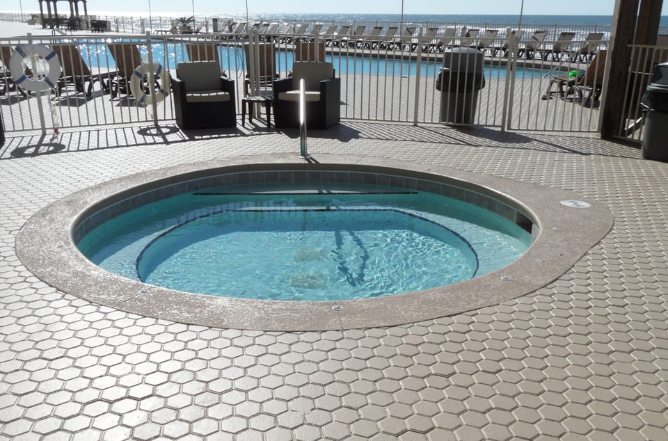 The new Hot Tub on the pool deck is a popular gathering spot.