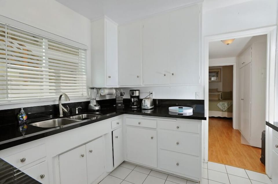 Fully equipped kitchen accented with granite counters