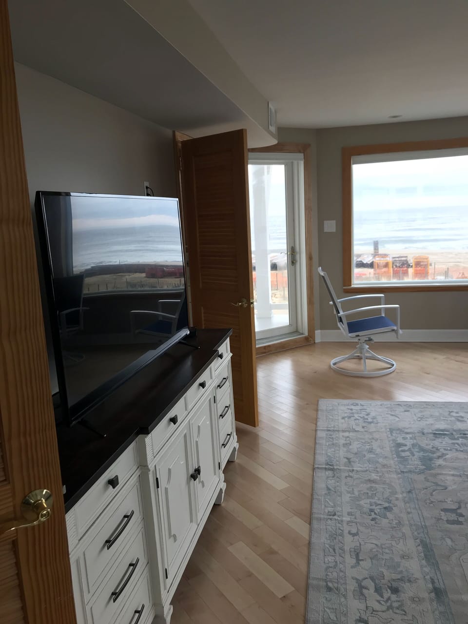 giant TVs and a beachfront view!