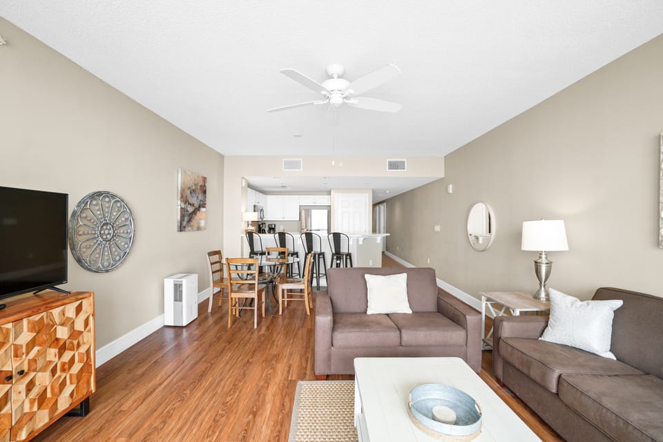 Large living area with ocean views and comfortable queen memory bed pullout