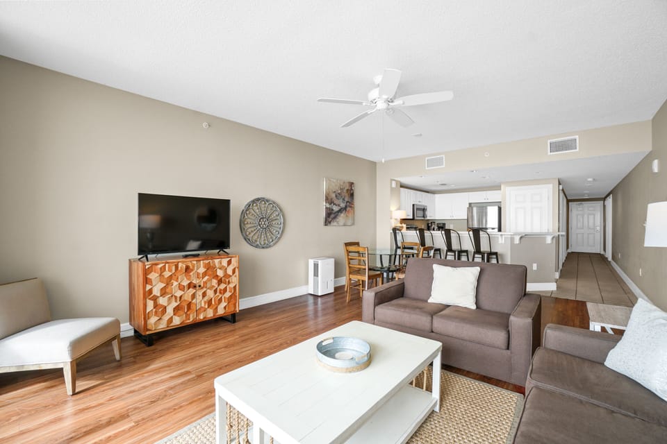 Large living area with ocean views and comfortable queen memory bed pullout