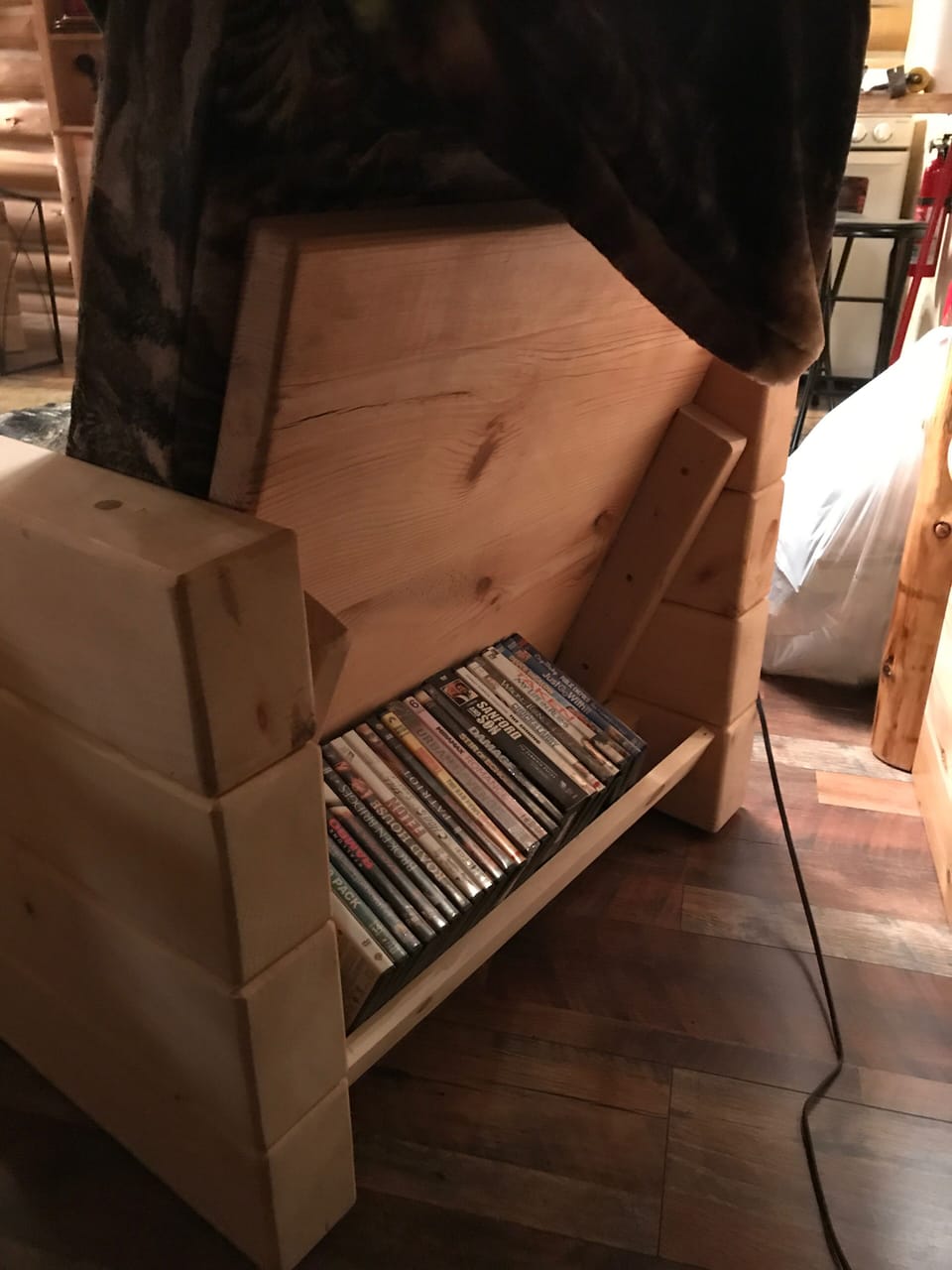 DVD’s for your use behind the chair next to the bed