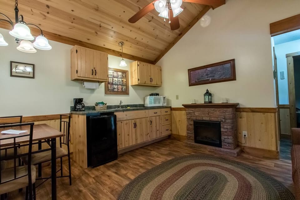 Kitchenette: Microwave, single-burner hot plate, 4-cup coffee pot, and small under-counter frig. Dishes, utensils, and cookware provided also.  