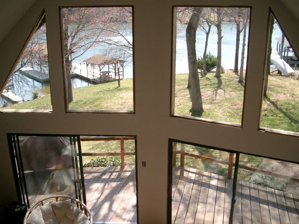 Windows give full view of lake from inside.