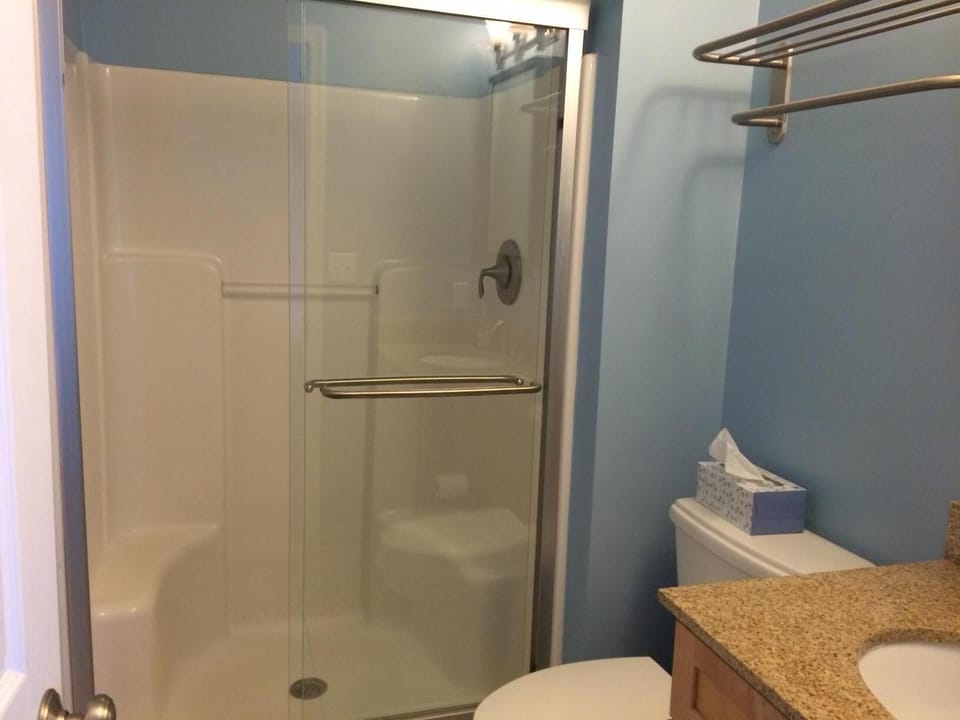 Master Bathroom with shower.  We have plenty of towel racks and shelves for you.