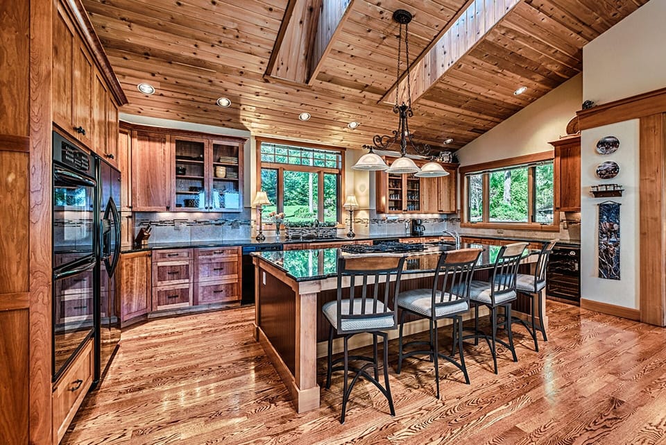 Gourmet kitchen with 2 ovens, 2 dishwashers, 2 microwaves & 10' granite island.