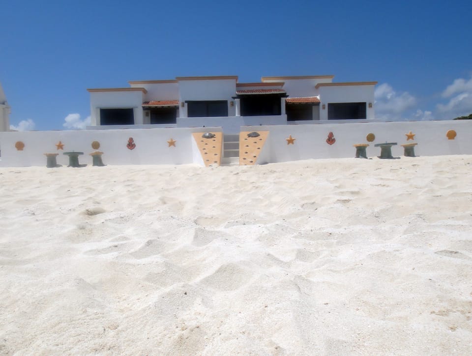 Beach at the Secret Beach villas in Playa del Secreto 